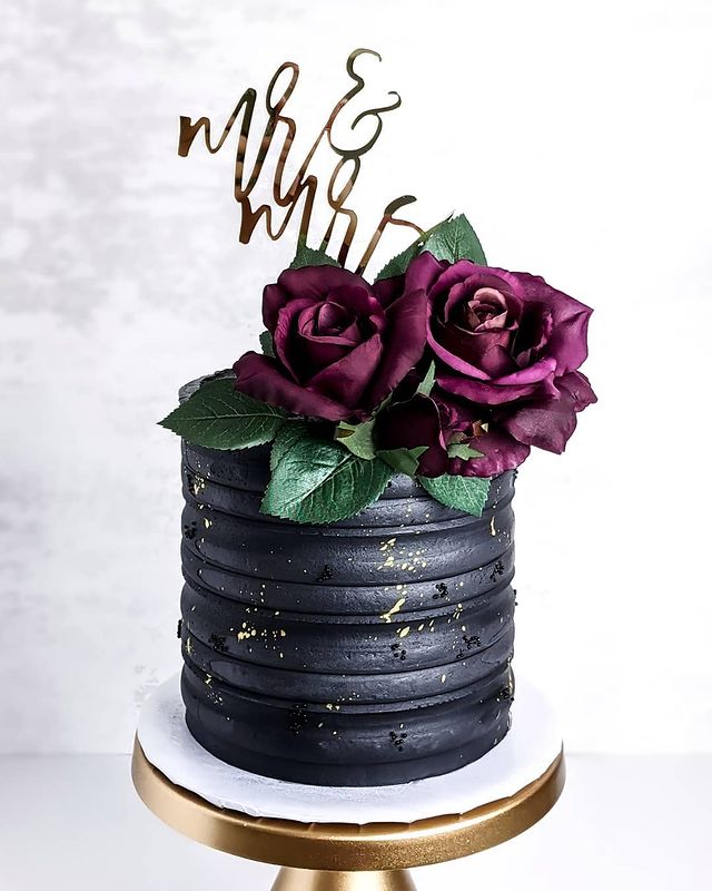 black cake, black cake decoration, black cake aesthetic, black cake ideas, black cake design, black wedding cake, wedding cake, unique wedding cake, black wedding cake ideas, black wedding cake elegant, black wedding cake designs, floral wedding cake
